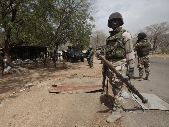 Binh lính Nigeria tại thị trấn Gwoza được giải phóng từ Boko Haram tháng 4-2015. Ảnh: AP