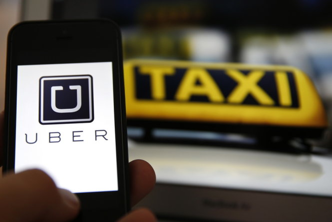 Bốn giả thuyết cho 'đại chiến' giữa Uber-Grab và taxi